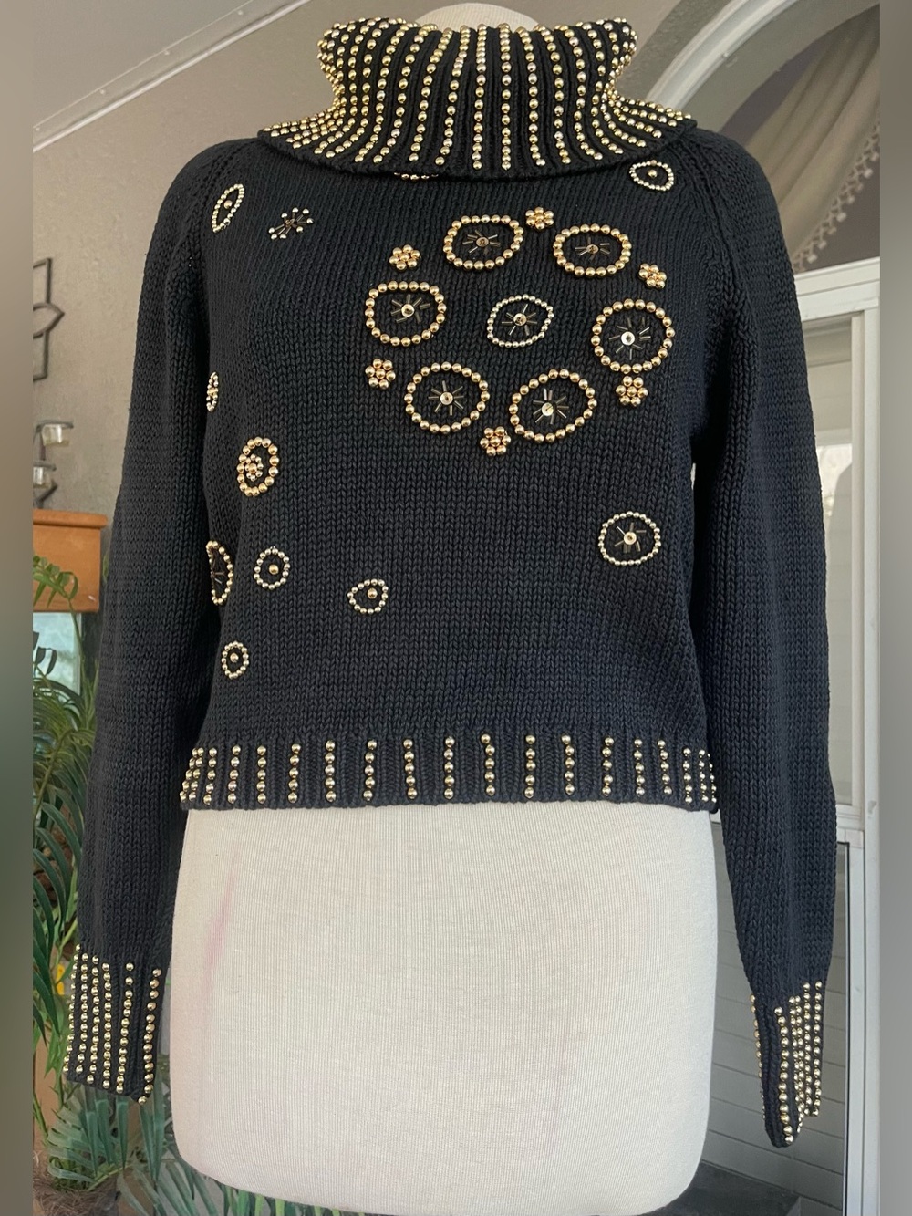 Black Stud-Embellished Turtleneck Sweater with Gold Accents